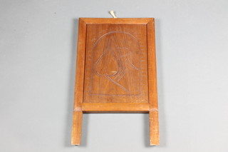A 19th Century rectangular plate travelling mirror contained in an Eastern carved hardwood frame 20"h x 11 1/2"w 