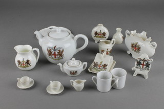 A crested teapot and quantity of crested vessels