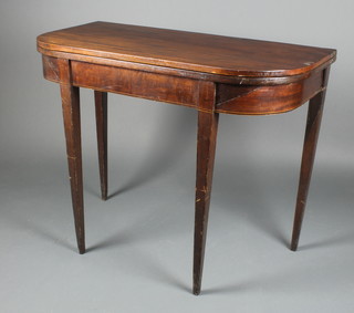 A Georgian mahogany D shaped tea table with satinwood stringing, raised on square tapered supports 31"h x 38"w x 19"d 