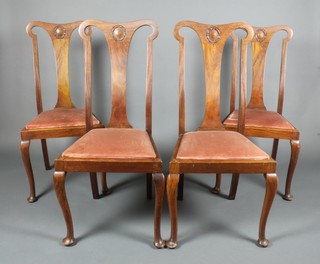 A set of 4 walnut Art Nouveau Queen Anne style slat back dining chairs with upholstered seats, raised on cabriole supports 