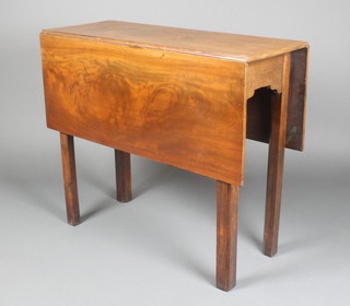 A Georgian mahogany drop flap tea table, raised on square tapered supports 28"h x 33"w x 12 1/2" when closed x 39" when opened