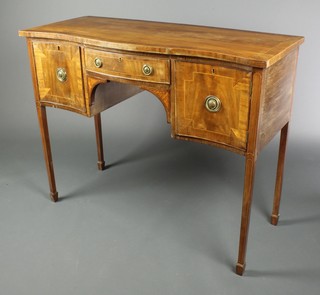 A Georgian style bleached mahogany bow front sideboard with crossbanded top, fitted 1 long drawer flanked by a pair of cupboards, raised on square tapering supports, spade feet, 33"h x 41 1/2"w x 17"d 