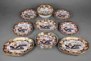 A 19th Century English Japan pattern part dinner service comprising 4 dinner plates, a deep bowl, 2 serving dishes and 2 oval plates 