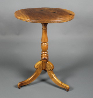 A 19th Century circular mahogany and oak snap top wine table, raised on a pillar and tripod base 28"h x 22"diam.  