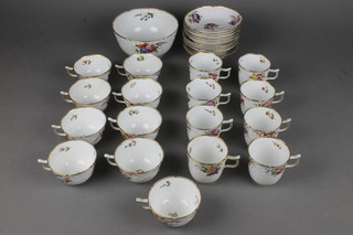 A 19th Century Spode teaset with floral and gilt decoration comprising 9 tea cups, 8 coffee cups, 11 saucers and a slop bowl 