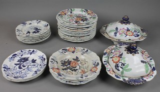 A 19th Century ironstone dinner service comprising 2 tureens and covers, 14 dinner plates, 10 side plates and 4 bowls 