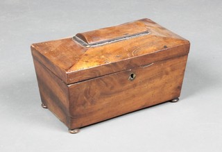 A Victorian mahogany sarcophagus shaped tea caddy with hinged lid, raised on bun feet 6"h x 9 1/2"w x 5 1/2"d 