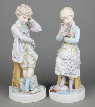 A pair of 19th Century German bisque figures of a seated boy and girl on circular bases 13 1/2" 