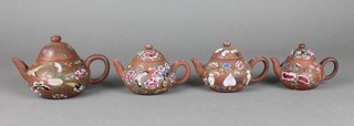 4 Chinese unglazed teapots with famille rose floral and insect decoration 