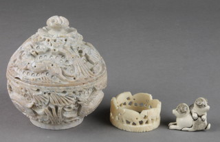 A modern carved hardstone box, a bone napkin ring and Netsuke 