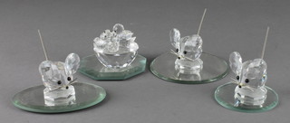 A collection of Swarovski animals on mirrored bases, 3 mice 1 1/4" and a nest of chicks 2"