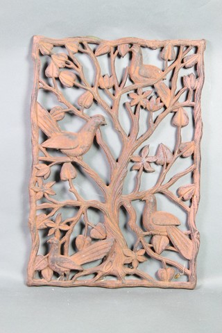 A rectangular pierced cast iron plaque decorated birds 21" x 14"