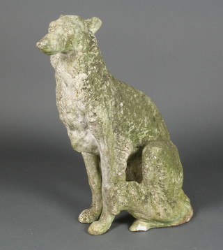 A well weathered reconstituted stone figure of a seated dog 29"h 