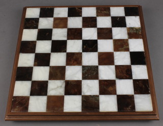 A marble effect chess board 14" x 14" 