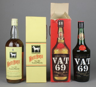 A bottle of VAT 69 whisky together with a bottle of White Horse Whisky