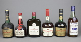 A 24 fl. oz bottle of Martel Cognac, 2 ditto Courvoisier, a 24 fl. oz bottle of Three Star Luxe Cognac, 1 other 500 ml, a 50 cl bottle of Grand Marnier liqueur  