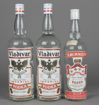 A 26 1/4 fl. oz bottle of Smirnoff vodka together with 2 litre bottles of Vladivar vodka