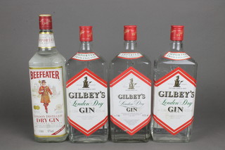 A litre bottle of Beefeater gin and 3 litre bottles of Gilbey's gin 