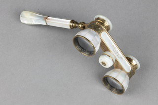Emil Busch, a pair of gilt metal and mother of pearl opera glasses marked Xmas 1934 