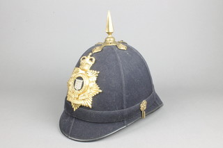 An Elizabeth II issue Royal Army Ordnance Corps Shako spiked helmet complete with helmet plate 