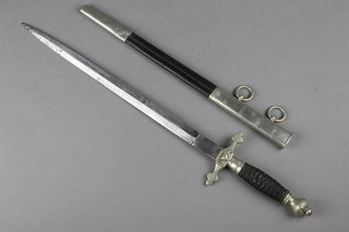 Carl Eickhorn, a German Fire Officer's dagger with 13 1/2" double edged blade, complete with leather scabbard