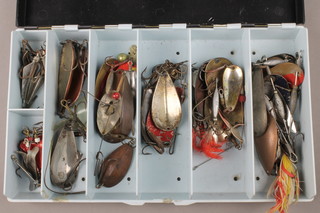 An Abu plastic lure box containing a collection of early 19th and 20th Century lures 