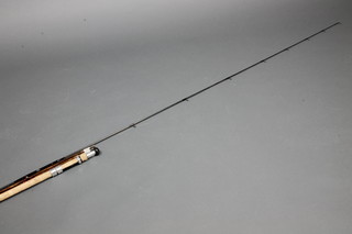A split cane 3 section fishing rod and a carbon fibre rod 