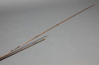 An Allcocks "Little Gem" twin section fly rod together with an A W Gamage  twin section carbon fibre fly rod 