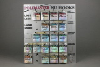 Polemaster Nu Hooks, a shop display board containing numerous 18-24 S hooks
