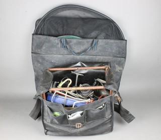 An Efgeeco tackle bag containing various reels and tackle together with a bag containing various keep nets etc 