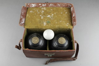 A pair of bowling woods complete with jack, cased 