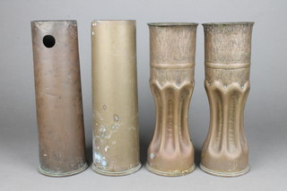 Trench Art, a pair of 18lb shell cases formed into waisted vases together with a pair of 18lb shell cases (1 fuse missing) 