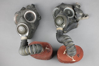 2 Second World War British military issue respirators dated 1940 and 1941  