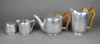 A 4 piece Picquot ware tea service comprising teapot, hot water jug, sugar bowl and cream jug 
