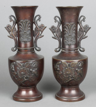 A pair of 19th Century Japanese bronze club shaped twin handled vases decorated birds amidst branches 12"h 