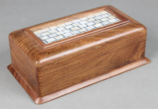 An Indian hardwood box, the top inlaid a mother of pearl panel and with secret locking mechanism 3" x 8" x 4 1/2" 