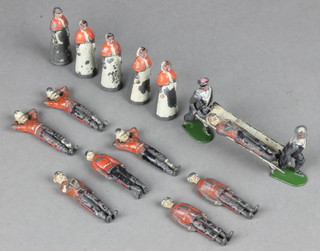 4 lead models of nursing sisters, 2 Naval stretcher bearers and stretcher, 8 Red Coat wounded soldiers