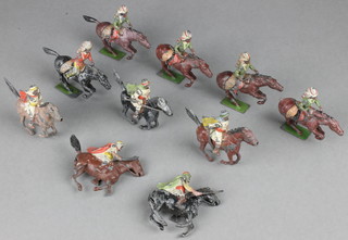 5 figures of mounted nomads (1 horse damaged), 5 mounted figures of Red Indians (3 of the horses tails are damaged, 2 holed) 