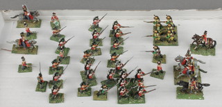 A collection of various metal figures of Napoleonic soldiers