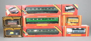 3 Hornby O gauge carriages, 4 items of Hornby rolling stock and 2 Mainline items of rolling stock, all boxed 