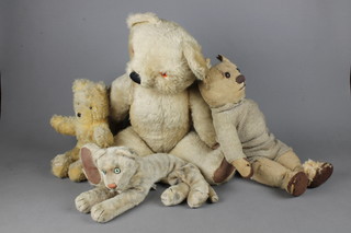 A Chad Valley yellow teddy bear with articulated limbs 26", a Pedigree figure of a lion 12" and 2 yellow teddy bears 21" and 15" 