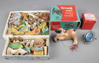 A Tri-ang Mimic puppy and spider, boxed, a scientific toy gyroscope, boxed and 2 wooden puzzles