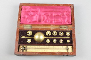 A Sikes hydrometer complete with ivory thermometer by T O Blake, contained in a mahogany box with hinged lid (missing magnifying glass), cased