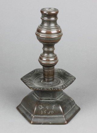 A 17th Century style bronze table lamp, raised on a panelled base, marked 1650, the base drilled 9 1/2" 