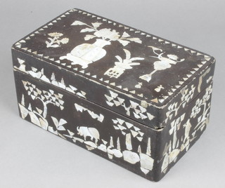 A rectangular Chinese black lacquered and inlaid mother of pearl trinket box, the decorated an urn, the sides decorated figures and animals 4 1/2" x 9 1/2" x 5 1/2" 