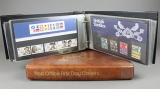 2 albums of first day covers 