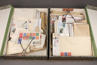 2 box folders containing a collection of various GB stamped and franked envelopes 