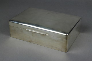 A large rectangular silver cigar/cigarette box with engraved inscription 9 1/4" x 6", Sheffield 1940
