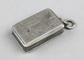 A George III rounded rectangular silver vinaigrette with chased floral decoration and vacant cartouche with plain silver grill 1 1/2" 