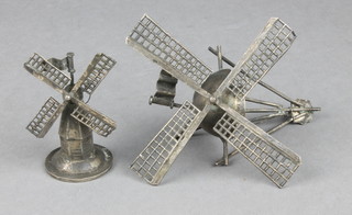 A 19th Century Dutch silver miniature model of a windmill 2 1/4", a ditto windmill top 4" 